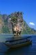 Thailand: Ko Tapu (Nail Island) and a longtail boat from Ko Khao Phing Kan (James Bond Island), Ao Phang Nga (Phangnga Bay) National Park, Phang Nga Province